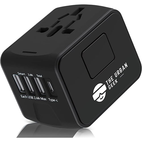 Black travel adapter with multiple ports and 'The Urban Geek' branding on a white background